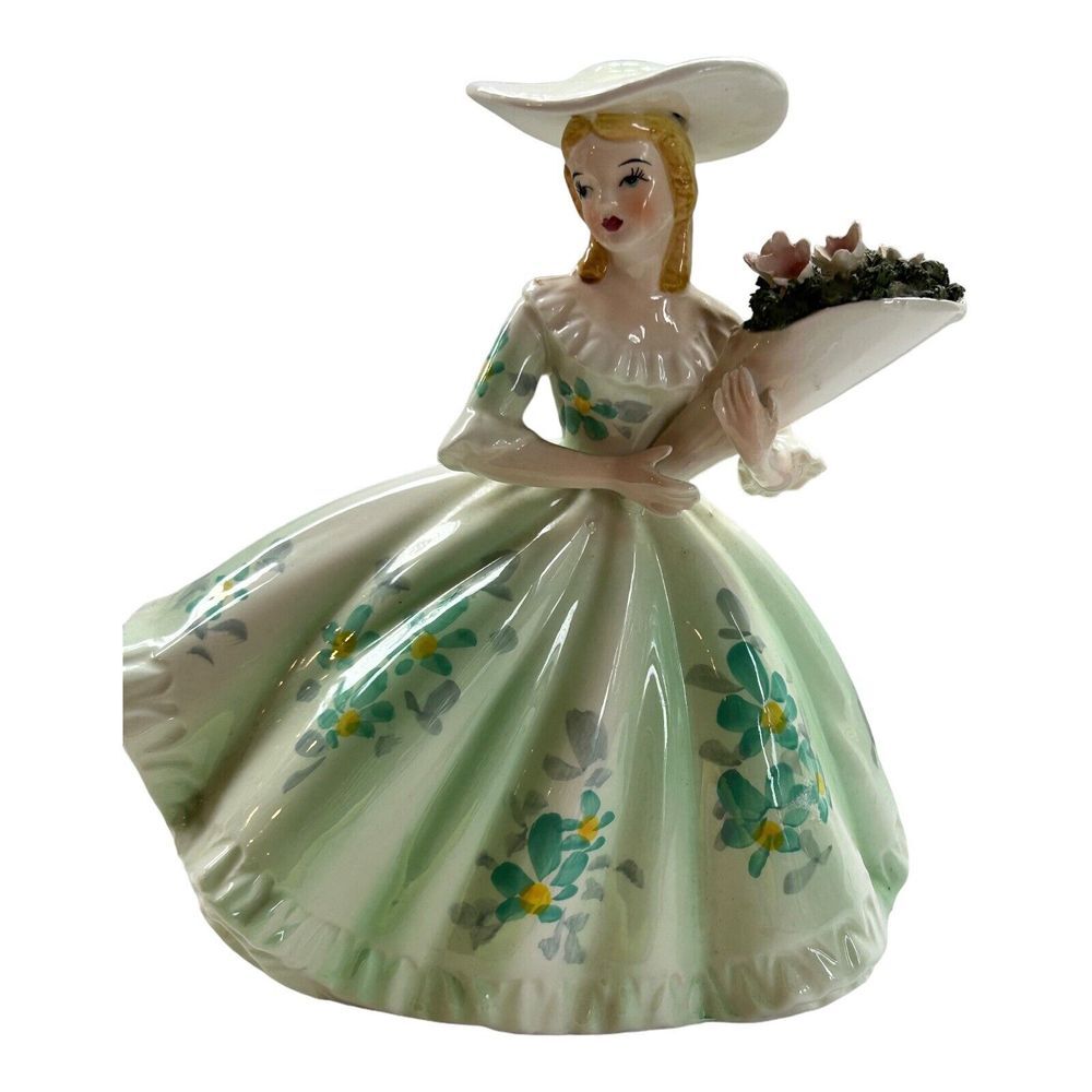 Lefton japan figurine Lady green dress holding roses has Lefton sticker